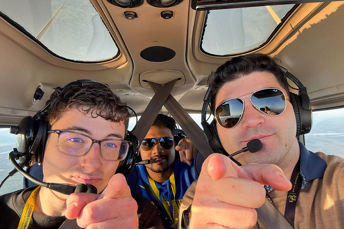 Embry-Riddle Student Government Association presidents Christopher Sorensen, Sreenath “Sree” Vijayakumar and Ander Turueno Garcia fly over the Daytona Beach area